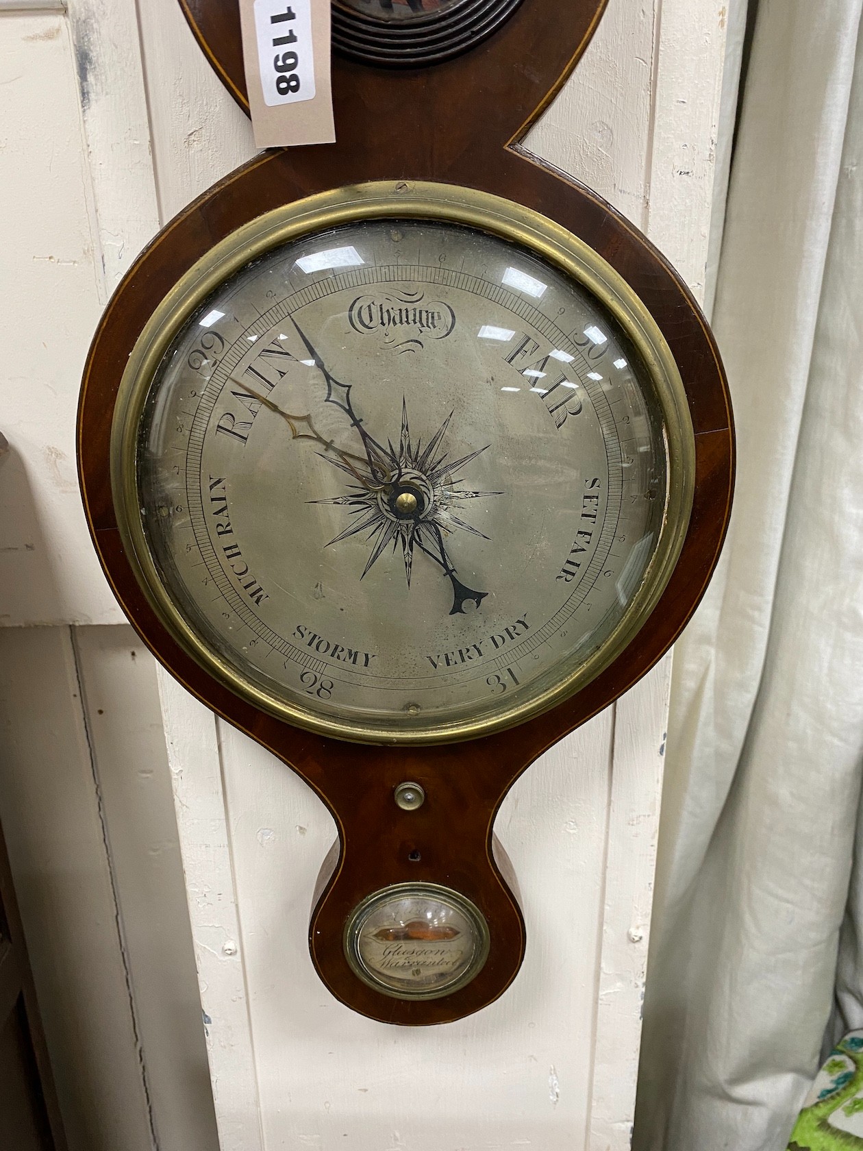 An early 19th century mahogany wheel barometer, height 98cm